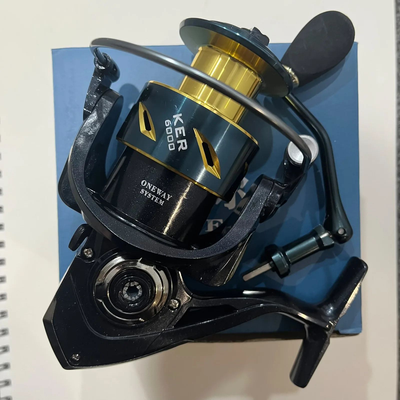 Bearking KER 6000 spinning reel on its box, spool showing KER 6000